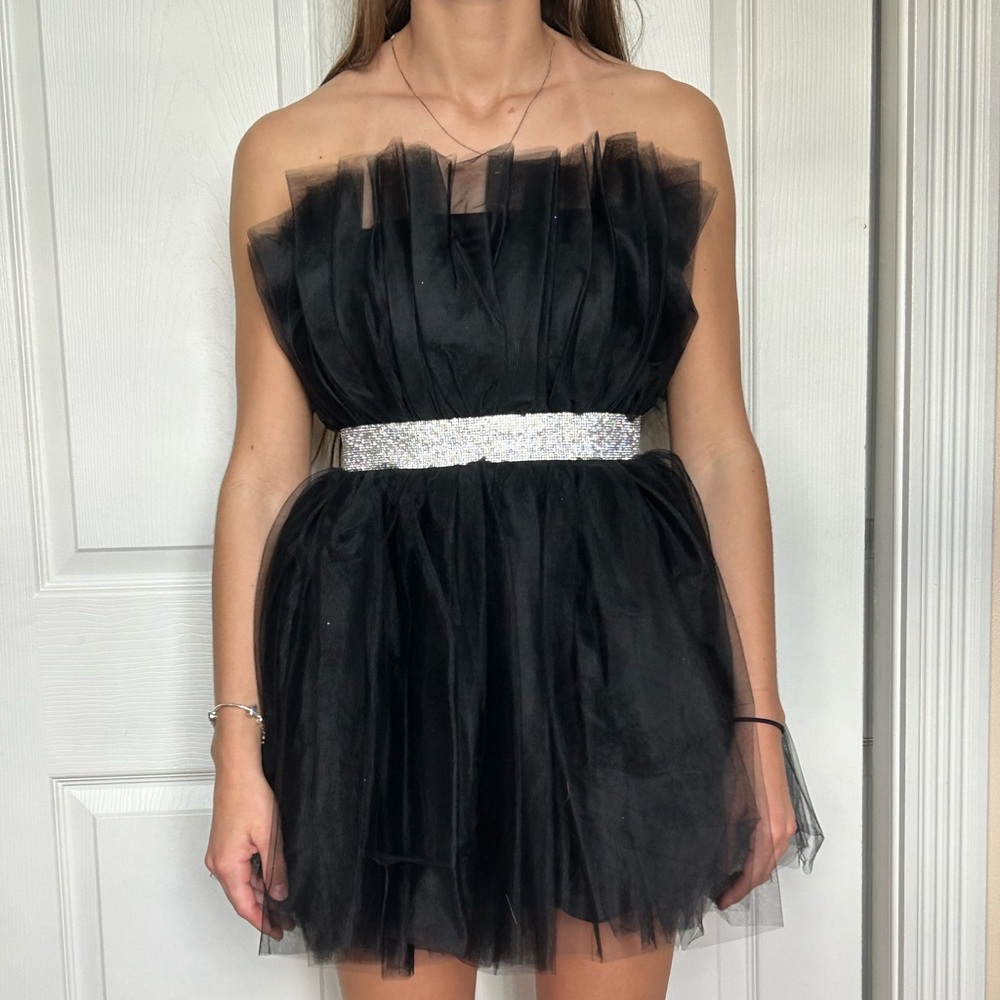 Beautiful cocktail dress.  Worn once. 
Size 3/4